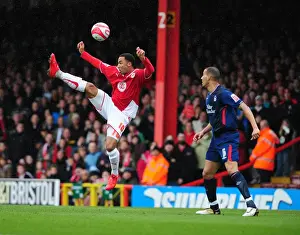 Bristol City V Nottingham Forest Prints: Aerial Clash: Maynard vs. Wilson in the Championship Showdown between Bristol City and Nottingham Forest