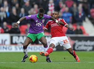 Agard vs. Obika: Intense Rivalry in Swindon Town vs. Bristol City Football Match, November 2014