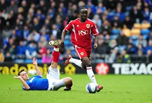 Portsmouth V Bristol City Prints: Albert Adomah: Slicing Through Defenses - Evading Scott Allan's Tackle at Fratton Park