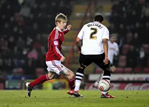 Bristol City V Swansea City Prints: Andy Keogh Beats Ashley Williams: A Pivotal Moment in the 2011 Championship Clash Between Bristol City and Swansea City