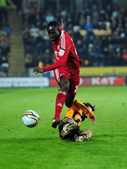 Images Dated 18th December 2010: Avoiding the Tackle: Albert Adomah Evades Jamie Devitt in Championship Clash between Hull City