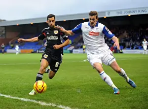 Baldock and Taylor in Pursuit: Intense Action from Tranmere vs. Bristol City, League One Football Match