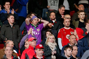 Images Dated 25th October 2014: Barnsley vs. Bristol City: Fans React as League 1 Match Ends in 2-2 Draw