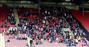Barnsley V Bristol City Prints: Barnsley vs. Bristol City: A Sea of Bristol City Fans at Oakwell Stadium