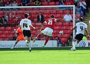 Images Dated 1st September 2012: Barnsley's Jacob Mellis Narrowly Misses from Distance in Barnsley v Bristol City Championship Clash