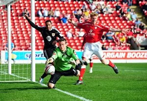 Images Dated 9th April 2011: Barnsley's Luke Steele Fails to Hold Back Bristol City's Onslaught, Championship Match, April 9