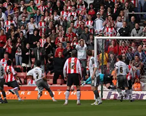 Basso's Determination: Star Goalkeeper of Bristol City FC in Action against Southampton