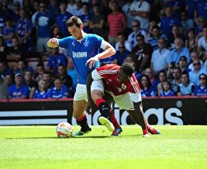Images Dated 13th July 2013: A Battle for Possession: Emmanuel-Thomas vs Wallace, Bristol City vs Glasgow Rangers