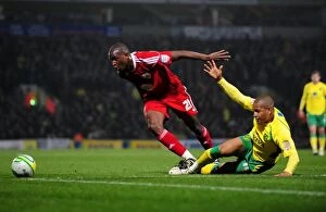 Norwich City v Bristol City Collection: Battling for the Ball: Cisse vs. Jackson in Intense Norwich City vs