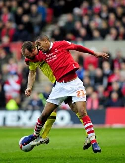 Nottingham Forest v Bristol City Collection: Battling for the Ball: Louis Carey vs. Dexter Blackstock - Nottingham Forest vs