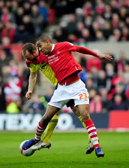 Nottingham Forest V Bristol City Prints: Battling for the Ball: Louis Carey vs