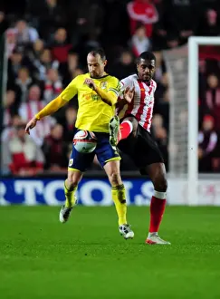 Southampton V Bristol City Prints: Battling for the Ball: Louis Carey vs