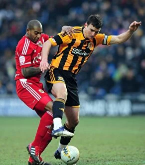 Hull City v Bristol City Collection: Battling for the Ball: Marvin Elliott vs. Jack Hobbs in Hull City vs