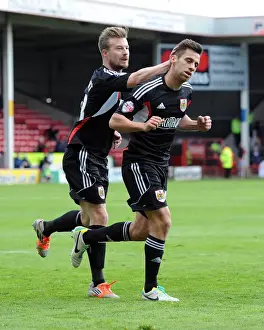 Battling and Celebrating: Sam Baldock and Wade Elliott's Moment of Triumph