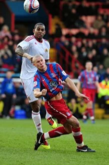 Images Dated 22nd January 2011: Battling for Championship Glory: Marvin Elliott vs. Alex Marrow (2011) - Crystal Palace vs
