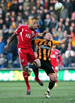 Hull City v Bristol City Collection: Battling for Championship Supremacy: Marvin Elliott vs. Paul McKenna - Hull City vs