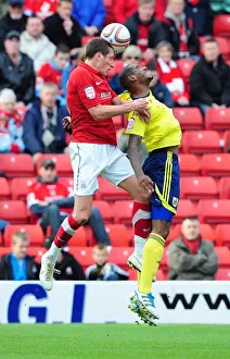 Barnsley V Bristol City Prints: Battling for Championship Supremacy: Marvin Elliott vs