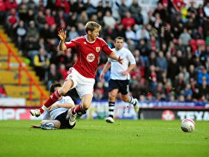 Images Dated 6th November 2010: Battling for Championship Supremacy: Stead vs. St. Ledger (2010) - A Football Rivalry at Ashton Gate