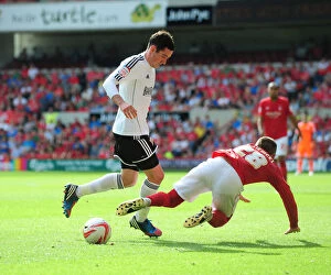 Images Dated 18th August 2012: Battling for Control: Cunningham vs. Majewski in Nottingham Forest vs