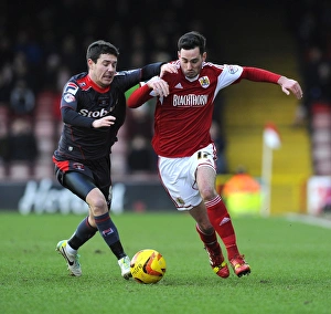 Bristol City V Carlisle United Prints: Battling for Control: Cunningham vs