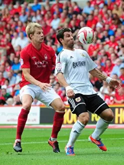 Images Dated 18th August 2012: Battling for Control: Foster vs. Harding in Nottingham Forest vs. Bristol City Championship Showdown