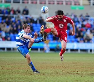 Reading V Bristol City Collection: Battling for Control: Hartley vs. Tabb in the Intense Championship Showdown between Reading