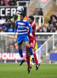Reading v Bristol City Collection: Battling for Control: Skuse vs. Karacan in the Intense Championship Clash between Reading