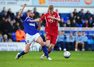 Ipswich Town V Bristol City Prints: Battling for Control: Stead vs. Delaney in the Intense Ipswich Town vs. Bristol City Clash