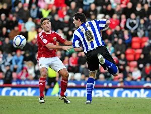 Bristol City v Sheffield Wednesday Collection: Battling for FA Cup Glory: Johnson vs. Miller - Bristol City vs. Sheffield Wednesday (2011)