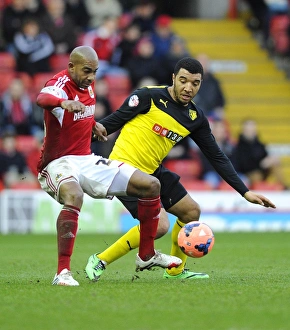 Battling for FA Cup Victory: Marvin Elliott vs. Troy Deeney at Ashton Gate, 2014