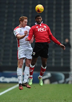 MK Dons V Bristol City Prints: Battling for the High Ball: Mark Little vs. Dean Lewington - Football Rivalry