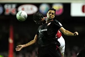 Images Dated 24th August 2011: Battling for the High Ball: McAllister vs. Magera in the 2011 League Cup Clash (Bristol City vs)