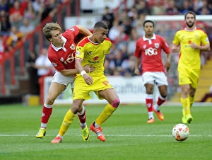 Bristol City V MK Dons Prints: Battling Rivals: Luke Freeman vs. Dele Alli - Intense Clash at Ashton Gate