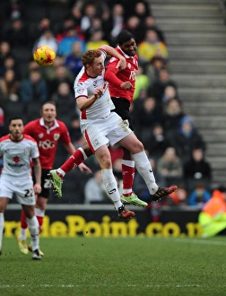 MK Dons V Bristol City Prints: Battling Rivals: Mark Little vs. Dean Lewington - A Football Showdown