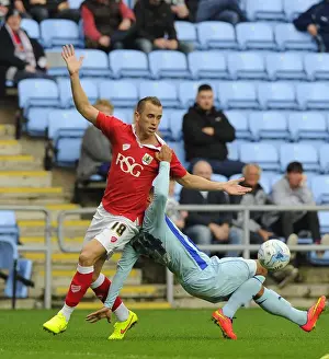 Battling Rivals: Wilbraham vs. Clarke in the Intense Bristol City vs. Coventry City Football Match
