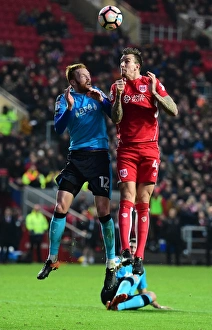 Bristol City V Fleetwood Town Prints: Battling for Supremacy: Aden Flint vs
