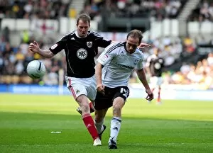 Images Dated 30th April 2011: Battling for Supremacy: Anderson vs. Clarkson in the Derby County vs