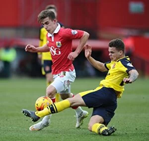 Images Dated 1st February 2015: Battling for Supremacy: Bryan vs. Forbes in the Thrilling Bristol City vs. Fleetwood Town Clash