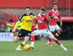 Bristol City V Fleetwood Town Prints: Battling for Supremacy: Bryan vs Morris in Intense Bristol City vs Fleetwood Town Clash