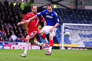 Images Dated 17th March 2012: Battling for Supremacy: Carey vs. Varney in Portsmouth vs. Bristol City Football Match, 2012