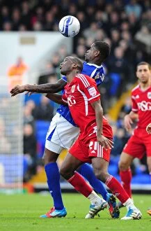 Images Dated 3rd March 2012: Battling for Supremacy: Cisse vs. Emmanuel-Thomas in Ipswich Town vs