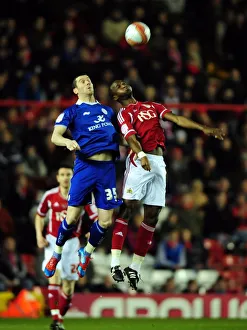 Bristol City V Leicester City Prints: Battling for Supremacy: Cisse vs. Nugent in the Bristol City vs. Leicester City Rivalry