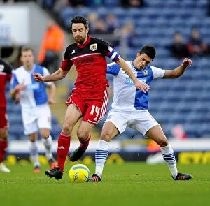Images Dated 5th January 2013: Battling for Supremacy: Cole Skuse vs. Jason Lowe in FA Cup Clash