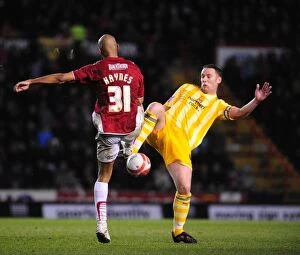 Images Dated 20th March 2010: Battling for Supremacy: Danny Haynes vs. Kevin Nolan in the 2010 Championship Clash between