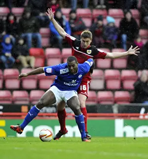 Framed Print : Battling for Supremacy: Davies vs. Morgan in Bristol City vs. Leicester City Championship Clash, January 2013