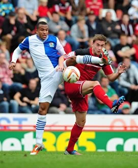 Bristol City v Blackburn Rovers Collection: Battling for Supremacy: Davies vs. Olsson in the Championship Clash between Bristol City