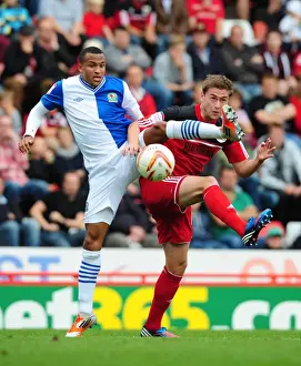 Bristol City V Blackburn Rovers Prints: Battling for Supremacy: Davies vs
