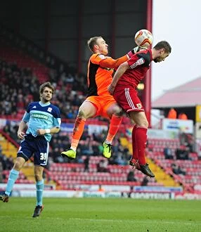 Images Dated 9th March 2013: Battling for Supremacy: Davies vs. Steele - A High Stakes Aerial Clash in Bristol City vs