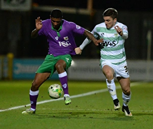 Yeovil Town V Bristol City Prints: Battling for Supremacy: Derrick Williams vs