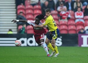 Images Dated 24th March 2012: Battling for Supremacy: Edwards vs. Emnes in Middlesbrough vs. Bristol City Football Match, 2012